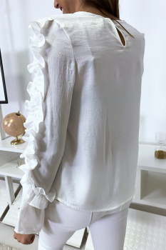 Blouse blanche matière brillante avec froufrou au buste et aux manches
