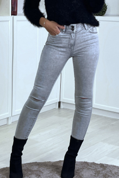 Jean skinny gris délavé, élimé aux genoux