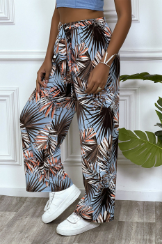 Pantalon palazzo fond bleu clair, imprimé feuilles